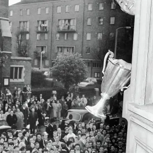 Tony Marchi waves the European Cup Winners Cup trophy from the Tottenham boardroom window 1963 Tony Marchi waves the European Cup Winners Cup trophy from the Tottenham boardroom window 1963