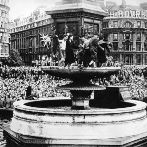 VJ Day Celebrations Print: People Dancing in Trafalgar Square Fountain VJ Day Celebrations Print: People Dancing in Trafalgar Square Fountain