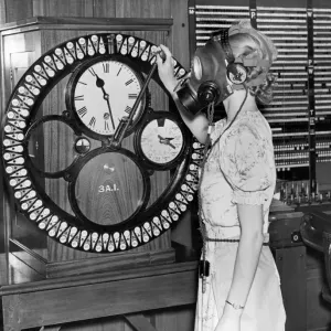 Print of Woman in Gas Mask at Work, 1938 Print of Woman in Gas Mask at Work, 1938