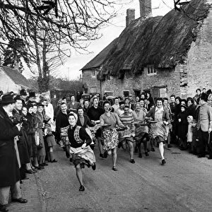 Women taking part in the annual pancake at Olney in Buckinghamshire