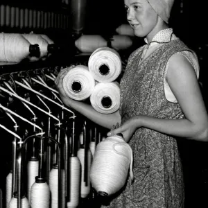 A women worker at a cotton factory A women worker at a cotton factory