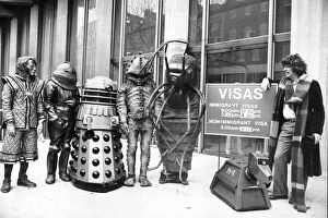 Famous Faces Collection: Actor Tom Baker as Dr Who, with his robot dog K-9, and assorted friends at the US Embassy 1978