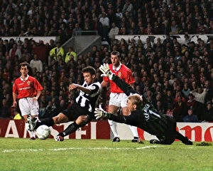 Images Dated 7th February 2024: Alessandro Del Piero shoots past Peter Schmeichel for Juventus first goal