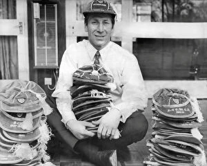 Images Dated 11th October 2023: Bobby Charlton, former England and Manchester United Footballer, with his collection of England caps