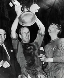 Black And White Prints: Bobby Charlton lifts the European Cup after winning the European Cup Final 1968