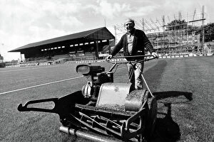 Brighton & Hove Albion Collection: Brighton & Hove Albion groundsman Frankie Howard mows the pitch at the Goldstone Ground 1979