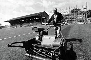 Brighton & Hove Albion groundsman Frankie Howard mows the pitch at the Goldstone Ground 1979