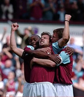 West Ham V Spurs Collection: Carl Fletcher of West Ham is congratulated on his goal by team-mates Nigel Reo Coker