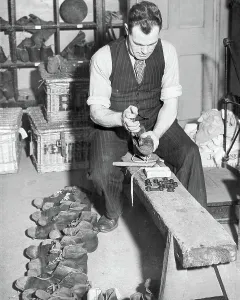 Charlton Athletic trainer Jimmy Trotter replaces the studs teams football boots 1945