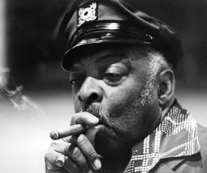 Famous Face Prints: Count Basie smoking a cigar