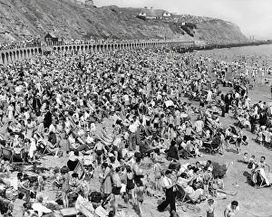 Beaches Prints: Crowds at Folkestone beach 1950s