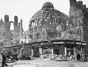 Forties Prints: The damaged dome of the Victoria building in Manchester 1940