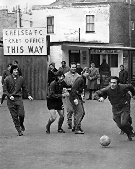 Dave Sexton, Chelsea FC manager with Ron Harris outside the Chelsea ticket office, 1970