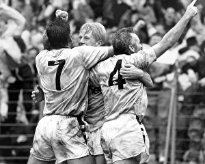 David White (Left) and Peter Reid (Right) with Colin Hendry after he scored Manchester City's third goal