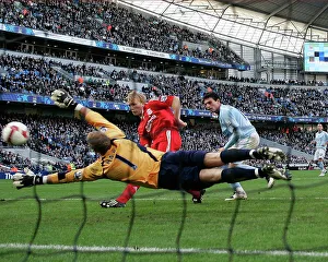 Liverpool V Man City Prints: Dirk Kuyt scores Liverpool's winner against Manchester City