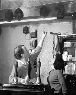 Everton Prints: Dixie Dean shows off his England caps at the Dublin Packet pub in Chester