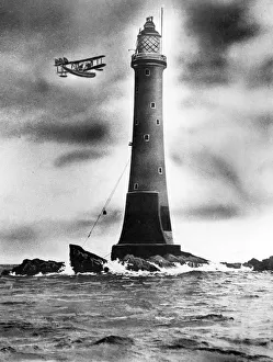 Eddystone lighthouse, with plane flying past