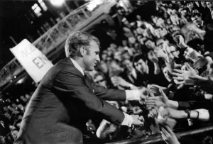 England captain, Bobby Moore, shakes hands with jubilant supporters at the World Cup celebrations