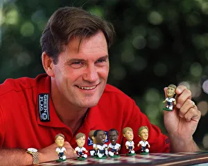 England Football Team Prints: England Manager, Glenn Hoddle playing with miniature figures of the England squad 1997