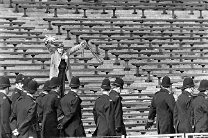 Scottish Football Prints: England v Scotland 1963 Lone scottish fan stays to celebrate as police move off