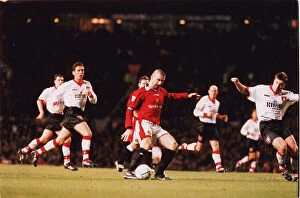 Manchester United Collection: Eric Cantona in action for Manchester United in 1996