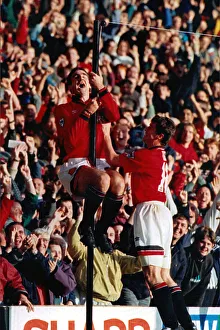 Eric Cantona celebrates