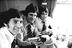 Images Dated 19th October 2023: Everton footballers celebrating with champagne. (L-R) Martin Dobson, Mick Lyons and Bob Latchford