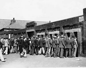 Manchester City FC Collection: Football fans queue to enter Manchester City F.C.'s Maine Road ground 1933