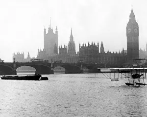 Thames Prints: Frank McCleans water plane moored by Westminster Bridge 1912