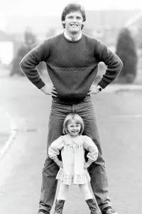 Gordon McQueen, former Manchester United footballer and television pundit is pictured with his daughter Hayley McQueen in 1983