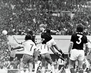 Scottish Football Collection: Gordon McQueen scores against England in 1977