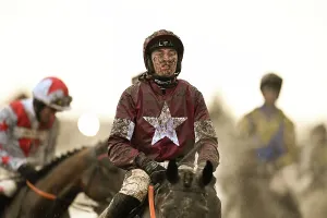 Horse Racing Prints: Harry Swan in the muddy last race on the Thursday evening in the last light of the day Cheltenham Festival week