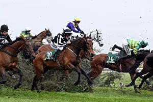Racing Prints: Horses clear the Chair jump on the second day at Aintree 2023