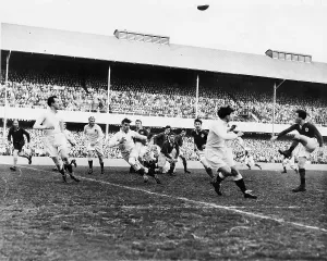 Ireland v England Rugby Jack Kyle (Ireland) kicks down field after a scrum. Ireland won 14-5 1949