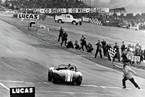 Archive Prints: Jack Sears in his AC Cobra at Brands Hatch taking the winners flag 1964