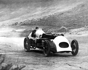 Motoring Prints: Jeffrey G. Parry Thomas testing at Brooklands in his 400hp racing car 'Babs' before his land speed record