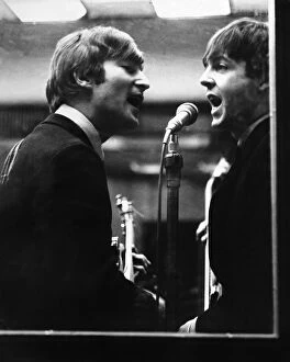 The Beatles Collection: John Lennon and Paul McCartney in a recording studio