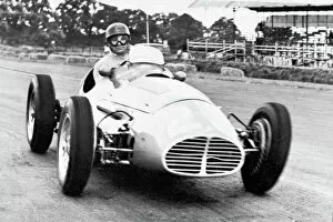 Images Dated 11th November 2019: Juan Manuel Fangio driving a Maserati 1953