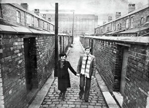 Manchester City FC Collection: Kazimierz Deyna Polish footballer with his wife Mariola, on a street in front of Manchester City