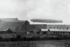 Aircraft Prints: L71, a German Zeppelin, landing at Pulham Aerodrome 1920
