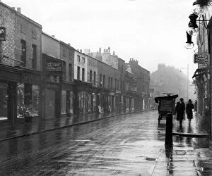 London Collection: Lambeth Walk in the rain 1938