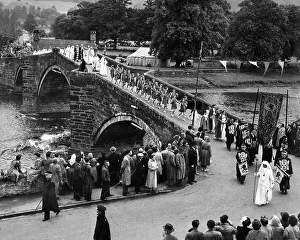 Fifties Prints: Llanwrst, Wales, Bardic procession crossing the bridge after the Gorsedd ceremony at the Eisteddfod