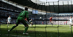 Manchester United Collection: Man Utd's Paul Scholes scoring the winner against Man City 2010