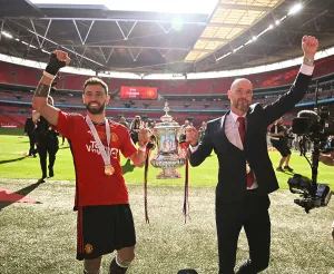 Archive Prints: Manchester United captain Bruno Fernandes and manager Erik ten Hag celebrate with the FA Cup