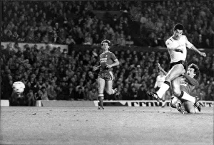 Manchester United's Paul McGrath scores as Mark Lawrenson challenges