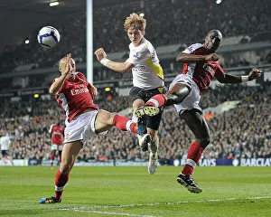 Pictures Prints: Mikael Silvestre and Sol Campbell tackle Roman Pavluchenko