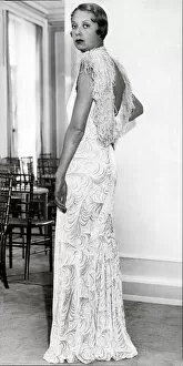 Images Dated 3rd July 2018: Model wearing embossed velvet evening dress 1932