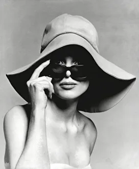 Fashion Prints: Model wearing floppy hat and sunglasses