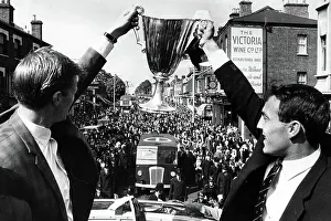 Tottenham Hotspur Prints: Peter Baker, left, and Jimmy Greaves with the European Cupwinners cup on their victory parade through North London 1963