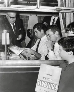 Chelsea F.C Prints: Peter Bonetti, Eddie McCreadie and Charles Pratt of Chelsea FC on train to Leeds as autograph hunters look on 1967